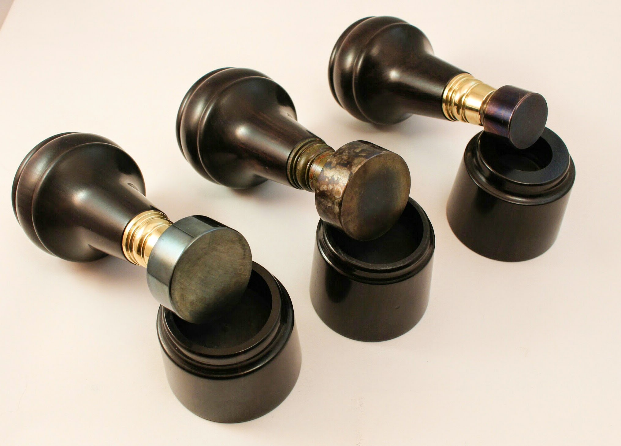 An echo from the past: Victorian-style handmade desk seal in beautifully turned African Blackwood with a hand-carved seal. The two components are coupled by a turned brass ferrule each piece comes with a matching Blackwood base.
Available in 20mm or 30mm diameter in either aged steel or blued steel, my handmade desk seals are ready for your family crest to be deeply and intricately engraved.
Contact me today and we’ll get started.